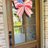 Red, White, and Bow Patriotic Door Hanger