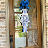 Beau the Blue & White Nutcracker Door Hanger