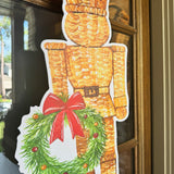 Wicker Nicholas Nutcracker Door Hanger