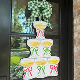Cheers Champagne Tower with Green and Red Bows Door Hanger