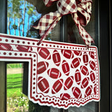 Oklahoma and Footballs Door Hanger