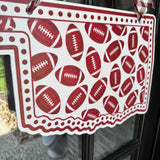 Oklahoma and Footballs Door Hanger