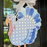 Paul Rattan Cane Blue Turkey Door Hanger